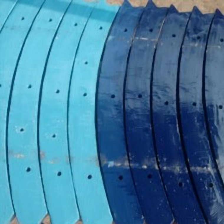 Bimetallic wear segment castings